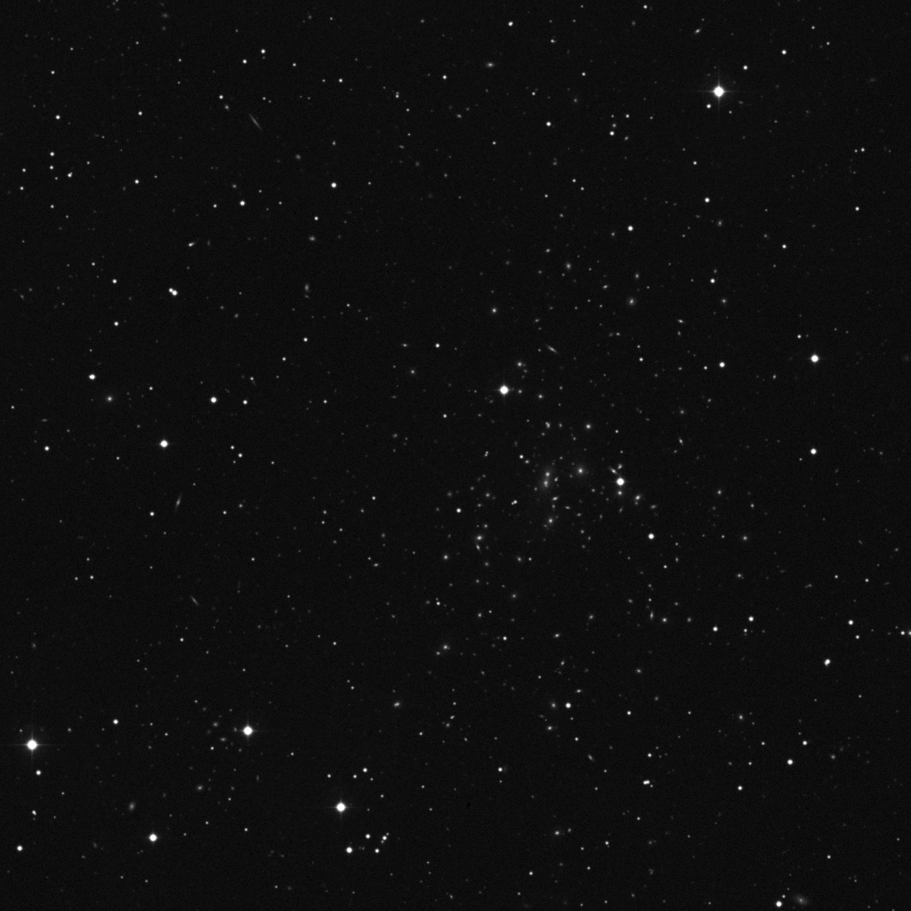 Kuva 6. Pohjan kruunun galaksijoukko Abell 2065. Kuva: DSS/POSS-2.