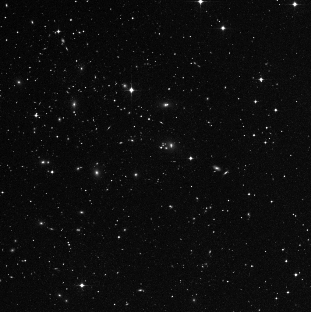 Galaksijoukko Abell 3128 Heilurikellon superjoukossa. Kuva: DSS/POSS-2.